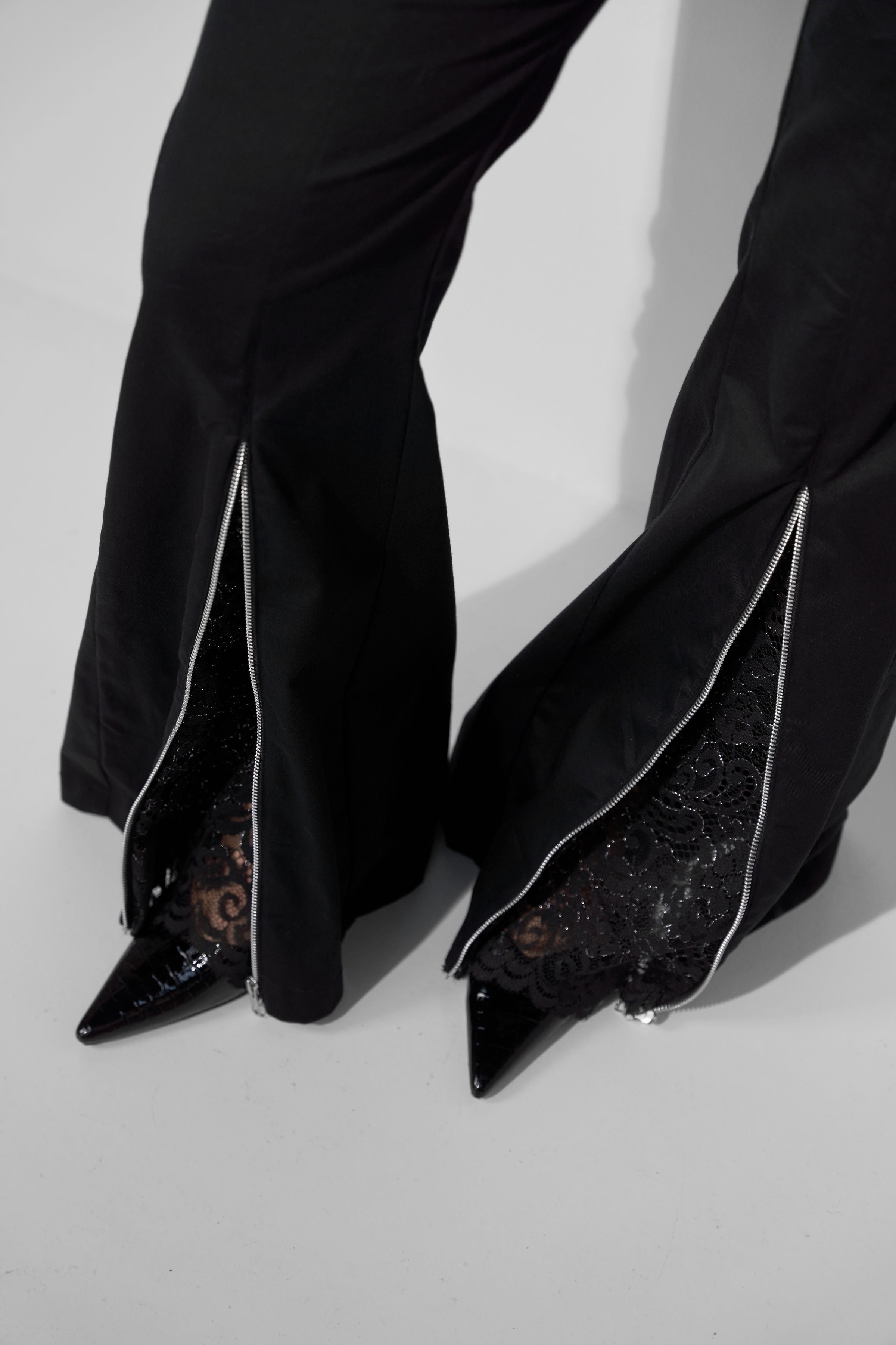 FLARED PANTS WITH LACE DETAILS